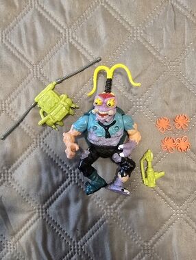 Vintage 1990 Scumbug action figure from the Teenage Mutant Ninja Turtles
